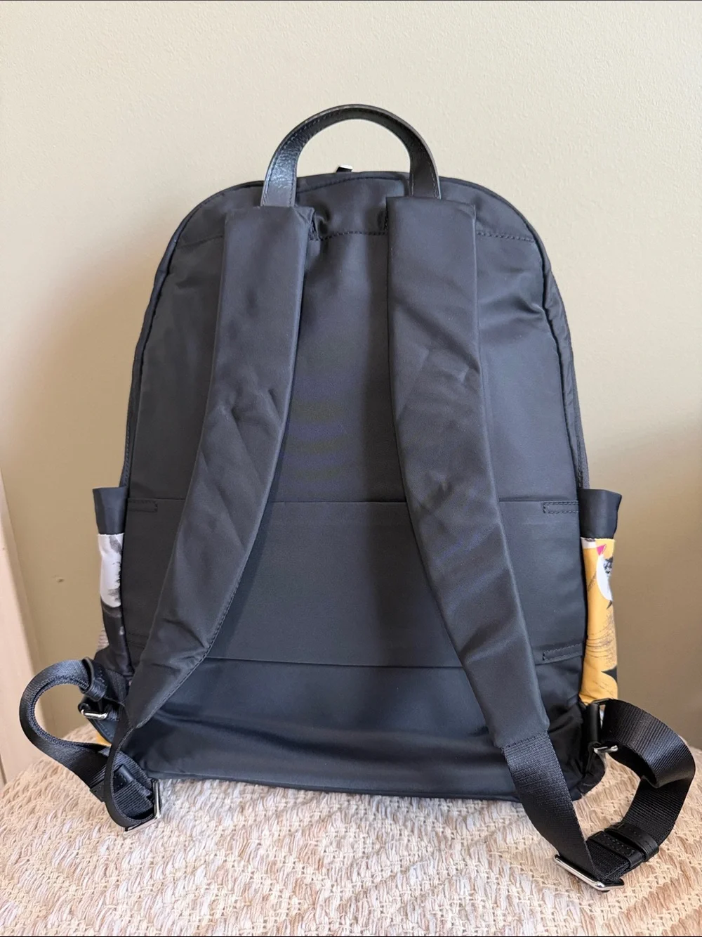 Tumi Black Backpack with Pink, Yellow & White Floral Print